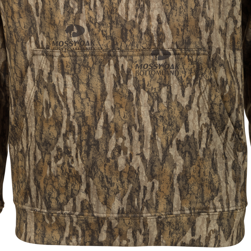 Youth MST Performance Hoodie - Realtree: Close-up of the hoodie showcasing its soft, combed fleece interior, double-lined drawstring hood, and kangaroo pouch.