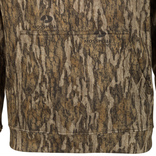 Youth MST Performance Hoodie - Realtree: Close-up of the hoodie showcasing its soft, combed fleece interior, double-lined drawstring hood, and kangaroo pouch.