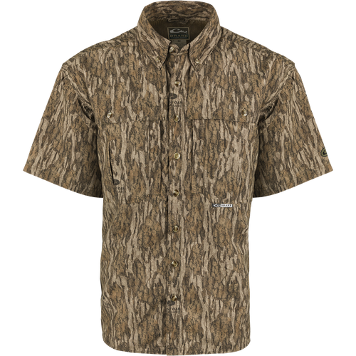 Camouflage Drake EST Camo Wingshooter's Short Sleeve Shirt with front vents, mesh back, chest pockets, and button-down collar designed for hunting and outdoor activities.