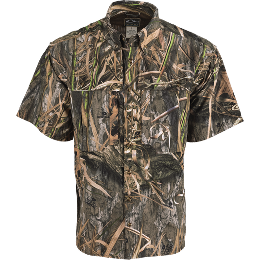 EST Camo Wingshooter's Short Sleeve Shirt, featuring vents, breathable mesh, and multiple pockets for functionality and comfort during hunting or outdoor activities.