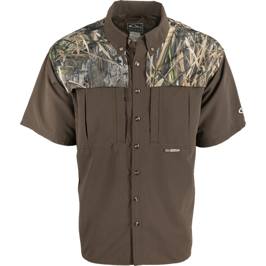 EST Camo Wingshooter's Short Sleeve Shirt featuring a camouflage design with vents, breathable mesh, and multiple chest pockets for hunting and outdoor activities.