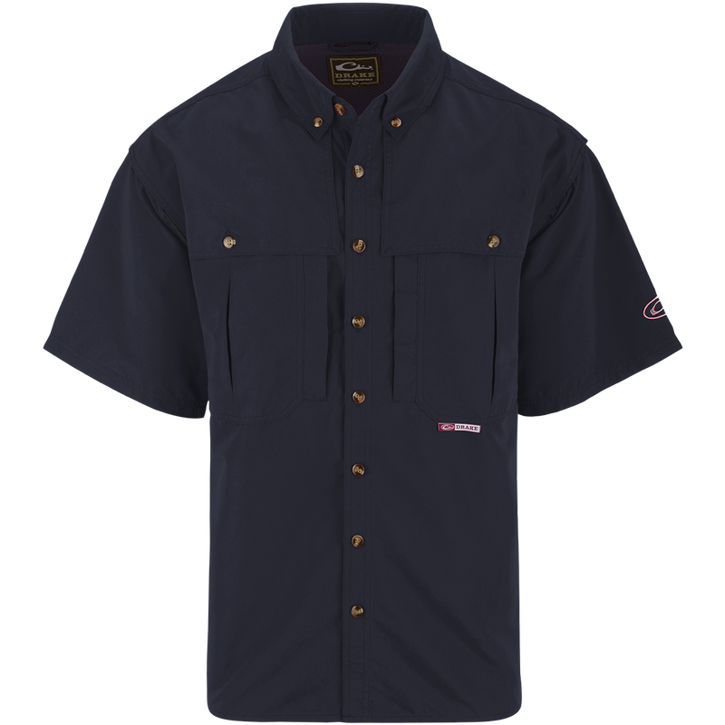 Solid Wingshooter's Shirt S/S with short sleeves, button front, large chest pockets, zippered pocket, and sun blocker extension collar. Ideal for hunting and fishing.