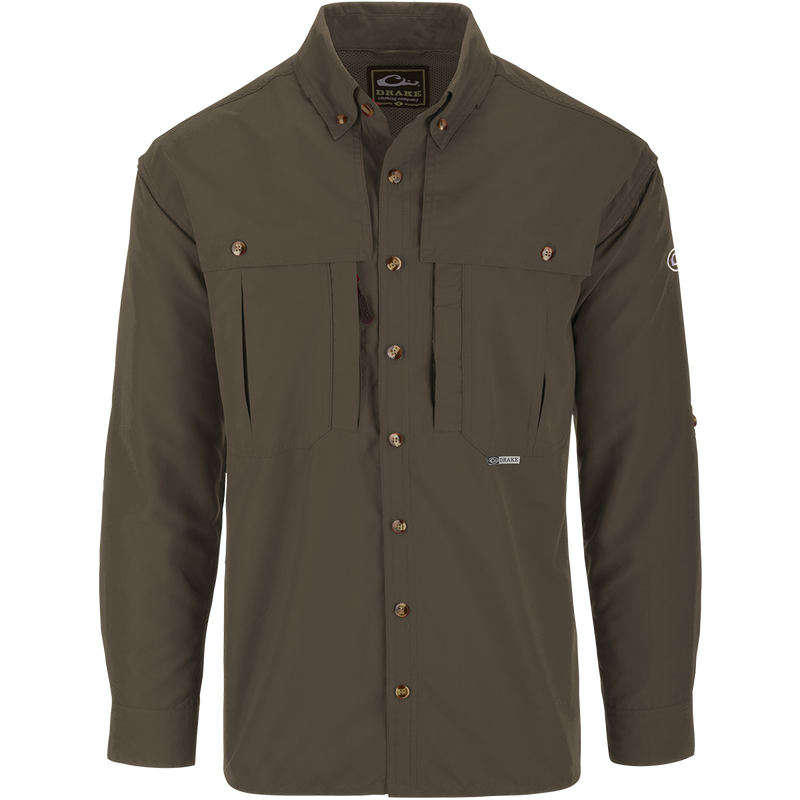 Solid Wingshooter's Shirt L/S with seven buttons, oversized chest pockets, zippered right chest pocket, and a roll-up sun blocker collar, designed for breathability and moisture management.