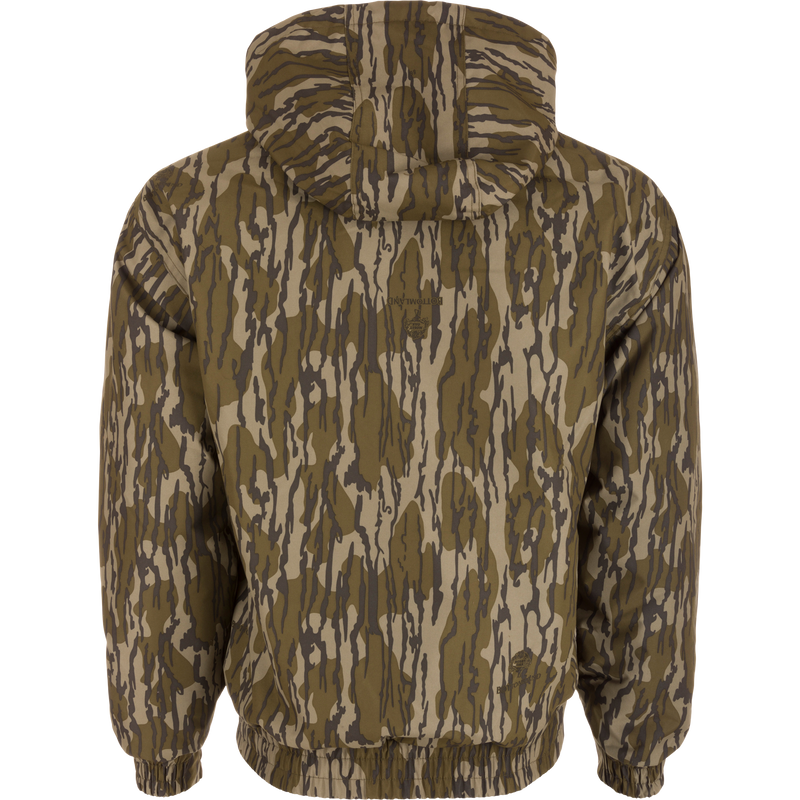 MST Waterproof Full Zip Jacket w/ Hood featuring a camouflage pattern, elastic cuffs, drawstring hood, and lower slash pockets for hunting in varied conditions.