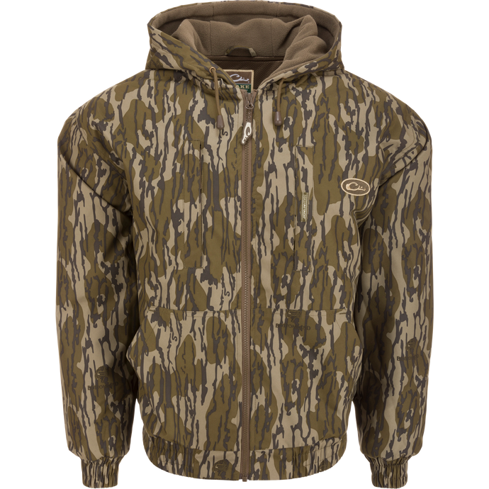 MST Waterproof Full Zip Jacket w/ Hood featuring camouflage design, zipper detail, elastic cuffs, and drawstring hood for hunting in various conditions.