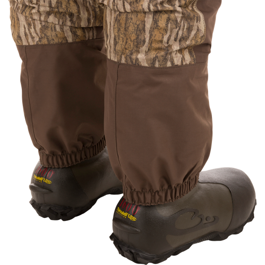Women’s Insulated Guardian Elite Vanguard Breathable Waders featuring HD2 material, reinforced seams, internal handwarmer pockets, and 1600g Thinsulate Buckshot Mud boots for superior warmth and comfort.