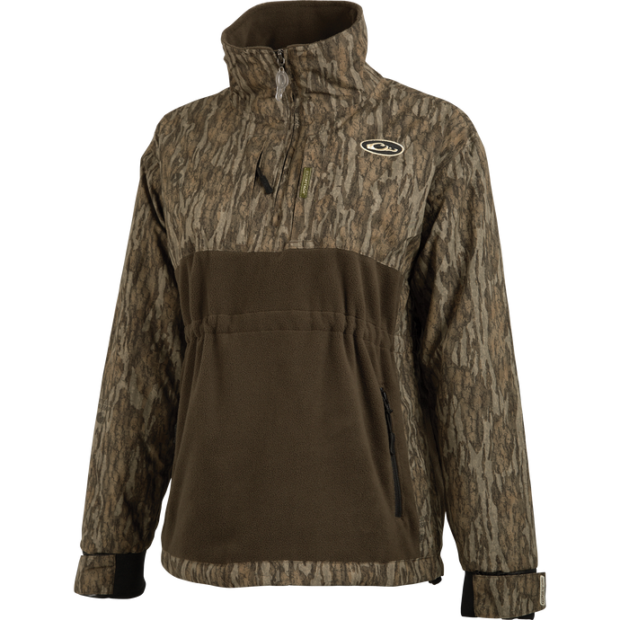 MST Women’s Eqwader Quarter Zip Jacket features waterproof sleeves, breathable fleece lower body, zippered chest pocket, and Magnattach™ pocket.