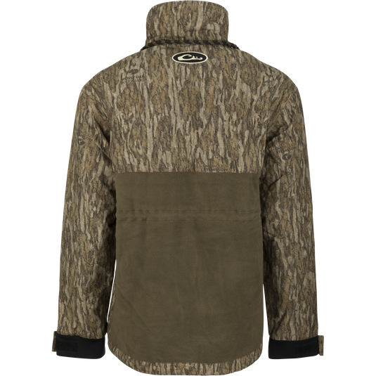 MST Women's Eqwader Full Zip Jacket with camouflage pattern, featuring waterproof sleeves and breathable fleece lower body, ideal for waterfowl hunting comfort and performance.
