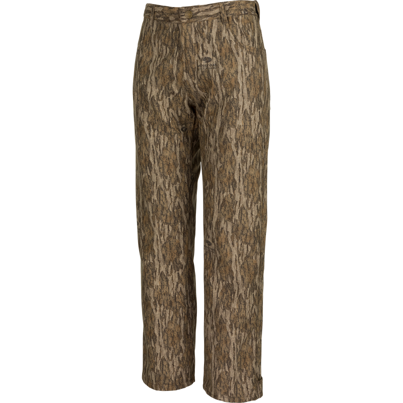 Alt text: MST Women’s Refuge Bonded Fleece Pants, camo design with tree pattern, waterproof/windproof/breathable material, fleece lining, adjustable waist, ankle cuffs, and stirrups. Ideal for hunting and outdoor activities.