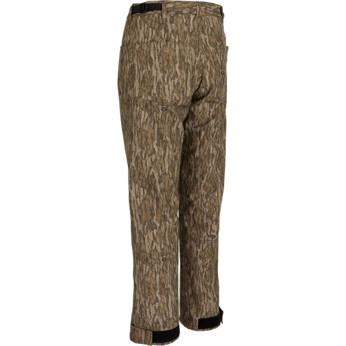 MST Women’s Refuge Bonded Fleece Pants: Camouflage pants with tree pattern. Waterproof/windproof/breathable, fleece lining, ankle garters, stirrups, adjustable cuffs. Ideal for hunting and outdoor activities.