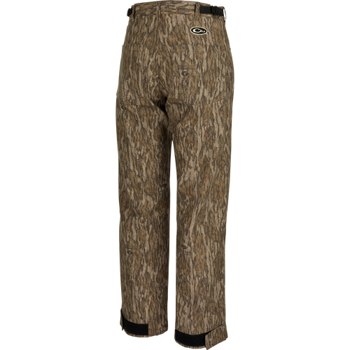 MST Women’s Refuge Bonded Fleece Pants: Waterproof camo trousers for duck hunting. Features fleece lining, ankle garters, and stirrups. Ideal for outdoor comfort.