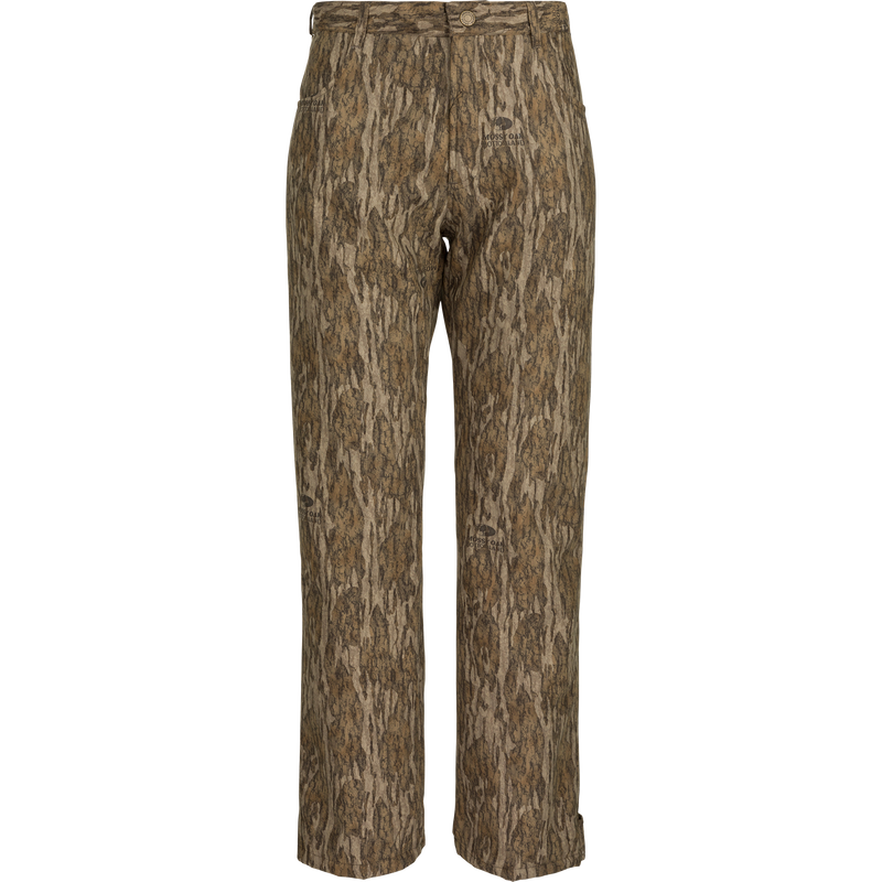 Alt text: MST Women’s Refuge Bonded Fleece Pants, camo design with tree pattern, waterproof/windproof/breathable material, fleece lining, adjustable waist, ankle cuffs, and stirrups. Ideal for hunting and outdoor activities.