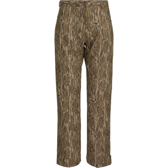 Alt text: MST Women’s Refuge Bonded Fleece Pants, camo design with tree pattern, waterproof/windproof/breathable material, fleece lining, adjustable waist, ankle cuffs, and stirrups. Ideal for hunting and outdoor activities.