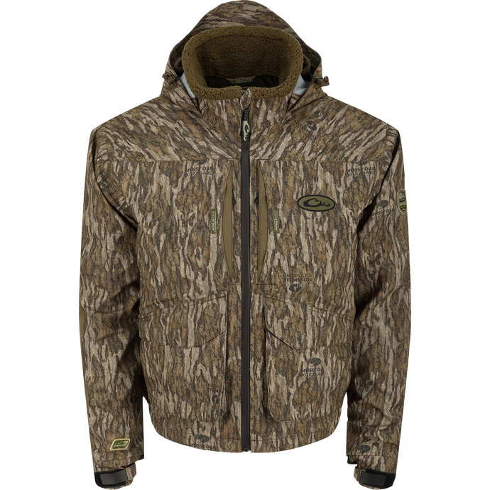 LST Insulated Timber Jacket with zippered chest pockets, sherpa-lined collar, and adjustable hood; designed for waterfowl hunters with durable, waterproof fabric and quick-access features.
