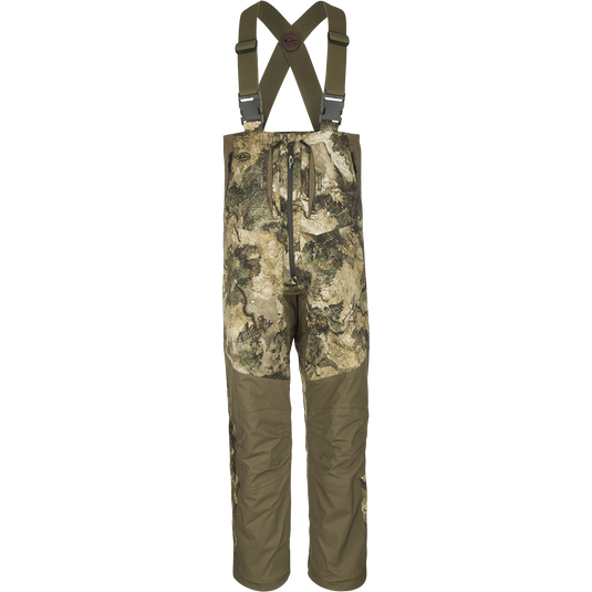 Guardian Flex™ G3 Flex™ Bib with BMZ System Liner, featuring camouflage design, adjustable suspenders, and removable insulation panels for adaptable hunting comfort.