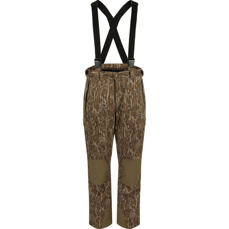 MST Waist-High Insulated Bibs with camouflage pattern and suspenders, featuring zippered pockets, adjustable Velcro waist, and heavy-duty elastic shoulder straps for secure fit.