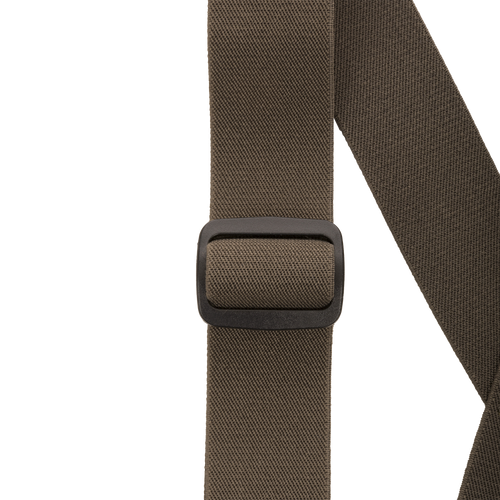 Close-up of the MST Waist-High Insulated Bibs' belt buckle, showcasing heavy-duty elastic suspenders and adjustable Velcro waist for a secure, customized fit.