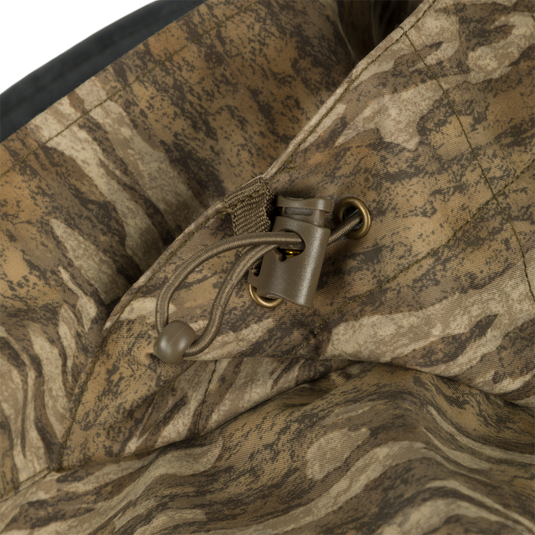 Close-up of the G3 Flex Uninsulated Waterfowlers Jacket, highlighting the rugged, waterproof fabric, durable zippers, and adjustable features for outdoor adventures.