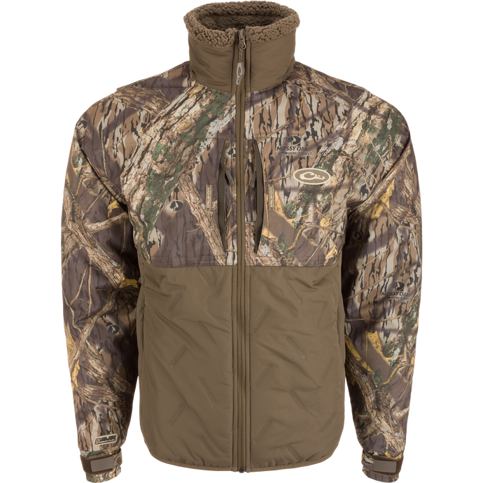 LST Guardian Flex Double Down Eqwader Full Zip Jacket with camouflage pattern, showcasing windproof, waterproof upper body, and abrasion-resistant lower body with advanced insulation and protection features.