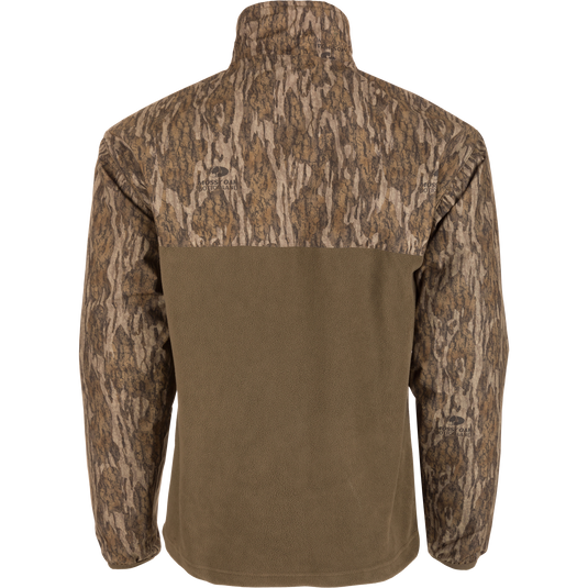 MST Quarter Zip Refuge Eqwader Jacket featuring a camouflage pattern, showcasing advanced waterproof and breathable fabrics, with close-ups highlighting the jacket's detailed design and innovative features.