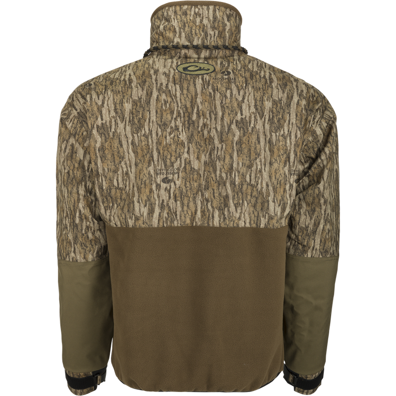 MST Guardian Flex Fleece Eqwader Quarter Zip Jacket with camouflage pattern, featuring waterproof upper and breathable fleece lower, suitable for outdoor activities.