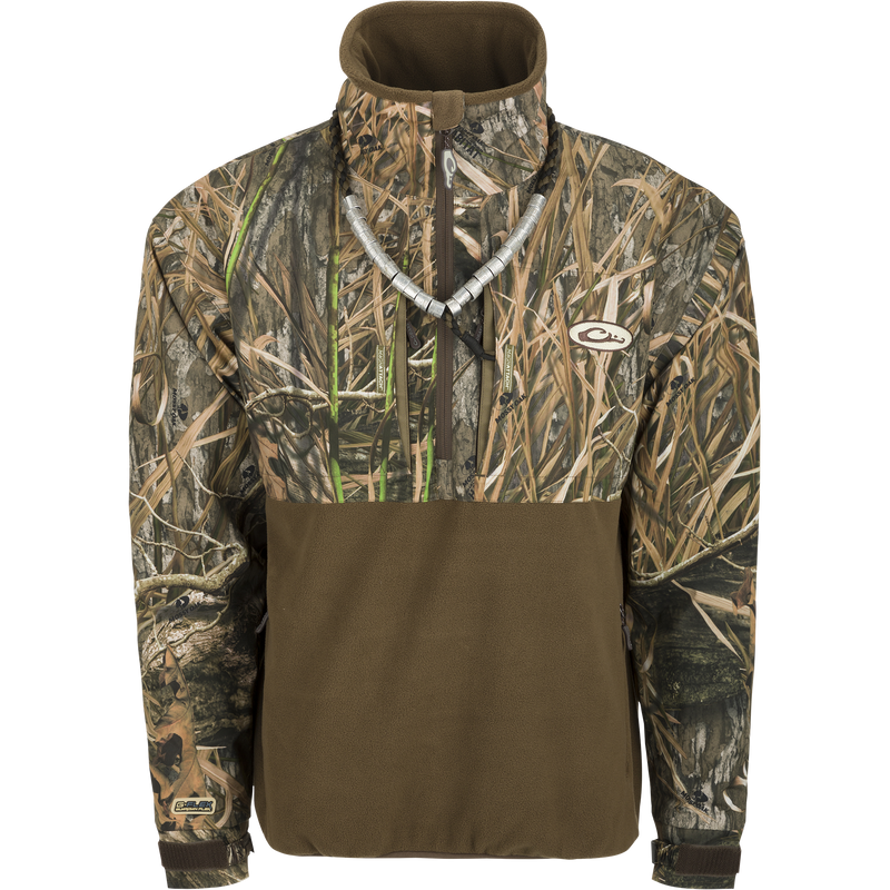 MST Guardian Flex Fleece Eqwader Quarter Zip Jacket showcasing camouflage pattern, long sleeves, zippered pockets, and reinforced elbows, ideal for hunting and outdoor activities.