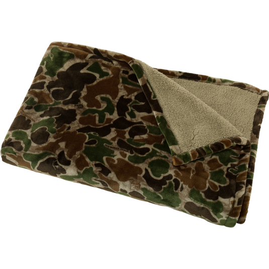 Alt text: Old School Fleece Throw with camouflage pattern, made from 100% polyester and lined with Sherpa fleece for warmth.