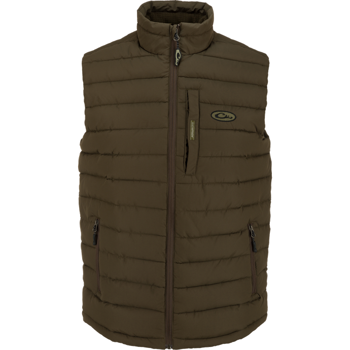 Close-up of the LST Double Down Layering Vest, featuring zippers, elastic cuffs, and a microfleece-lined collar for warmth and comfort.