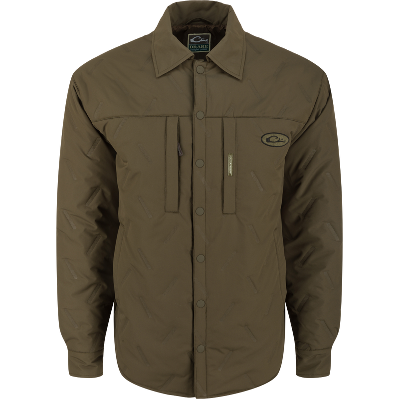 LST Double Down Jac-Shirt: a close-up of a logo on a jacket, a button on a jacket, outerwear with collar, sleeve, fabric, and pocket.