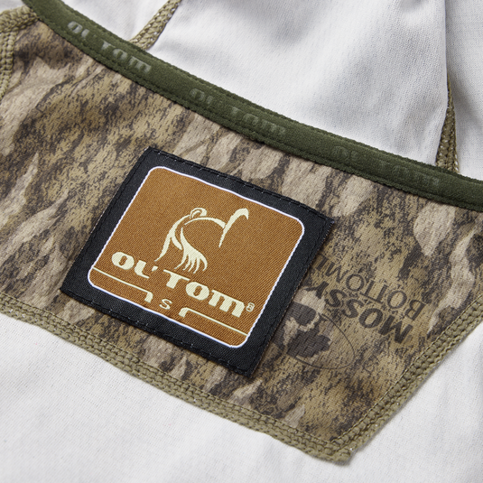 Close-up of Logo on Early Bird Gator Hoodie with Insect Repellent featuring a square patch with a bird motif, highlighting its durable, breathable fabric and versatile outdoor features.