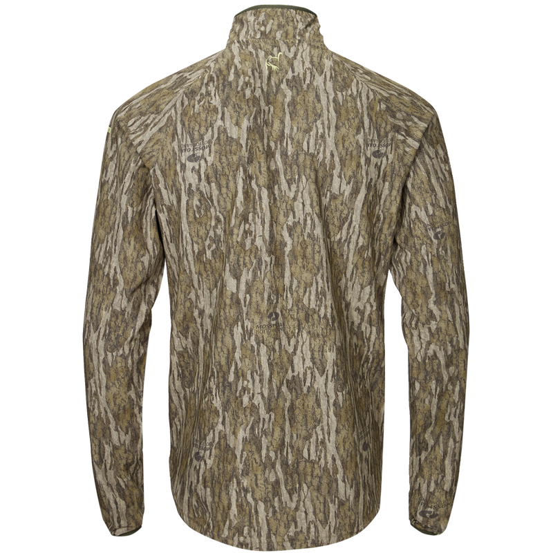 Half Zip Pullover with Spider Web Technology featuring ergonomic thumbholes and a water-resistant chest pocket, designed for enhanced breathability and durability in hunting conditions.