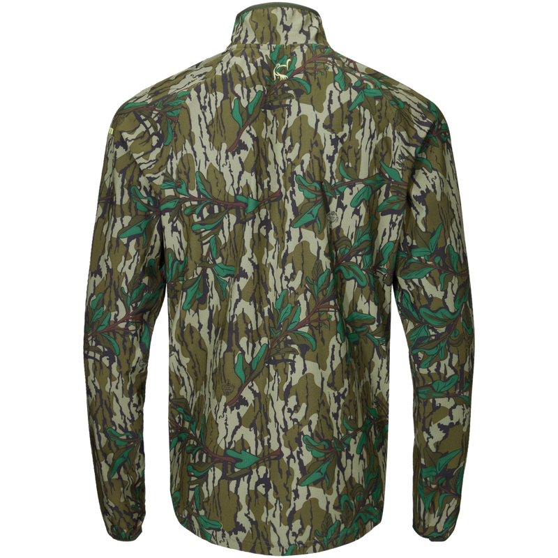 Half Zip Pullover with Spider Web Technology, featuring a camouflage pattern and ergonomic thumbholes, ideal for turkey hunting with its breathable, water-resistant fabric.