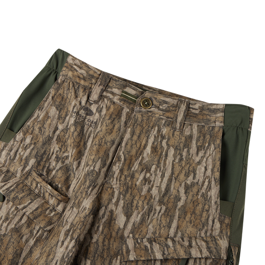 Early Bird Turkey Pant with Insect Repellent featuring camouflage design, durable polyester, stretch waistband, and cargo pockets, ideal for turkey hunting with tick protection.