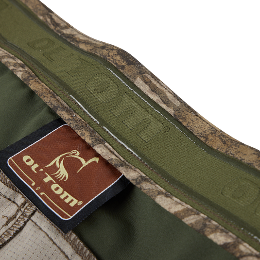 Close-up of the Early Bird Turkey Pant label, showcasing its Vital Protection insect repellent technology for enhanced tick protection during hunting.