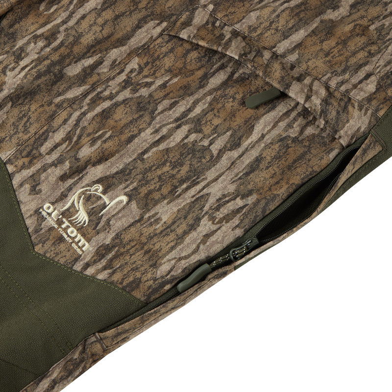 Close-up of the Early Bird Turkey Pant with Insect Repellent, highlighting its durable polyester material, cargo pocket, and insect protection features for enhanced hunting mobility.