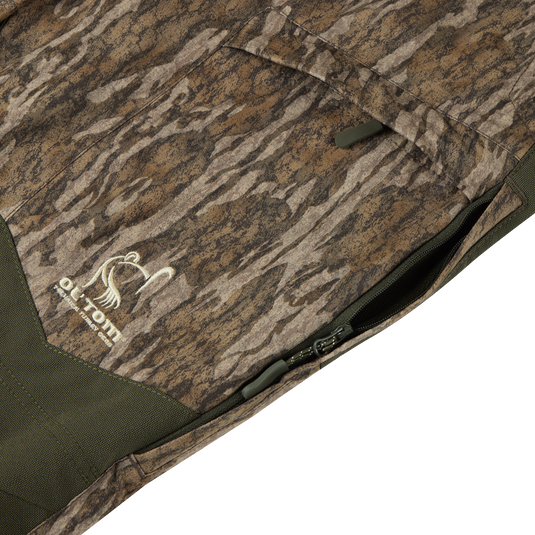 Close-up of the Early Bird Turkey Pant with Insect Repellent, highlighting its durable polyester material, cargo pocket, and insect protection features for enhanced hunting mobility.