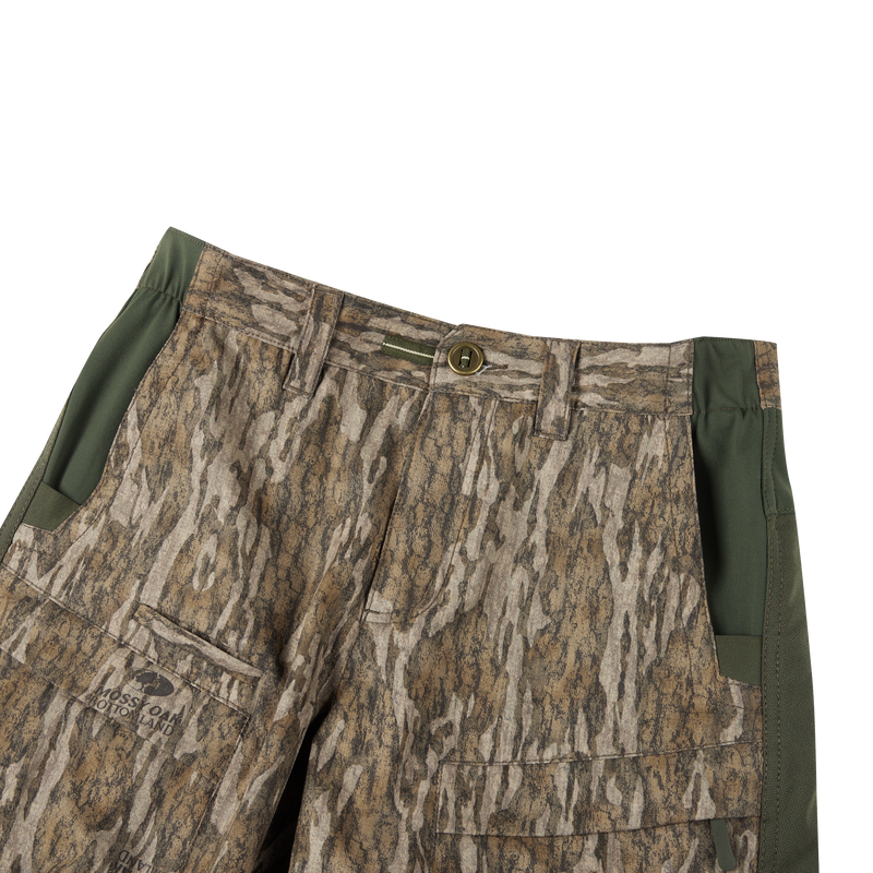 Turkey Pant with Spider Web Technology, featuring camouflage design, stretch hip panel, and reinforced knees for stealth and comfort in hunting.