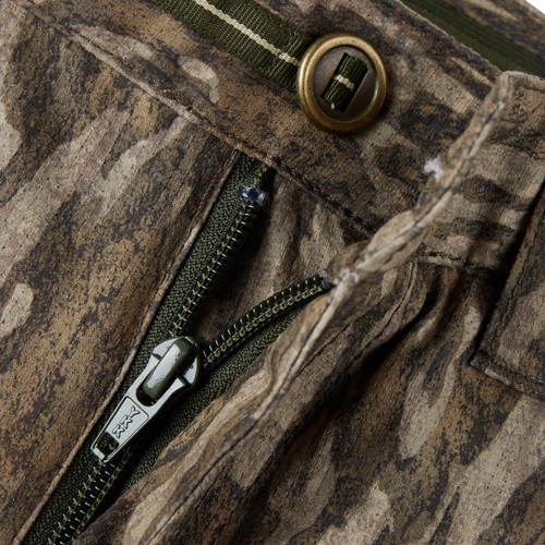 Close-up of the zipper and button on the Turkey Pant with Spider Web Technology, highlighting the durable, breathable fabric designed for silent hunting.