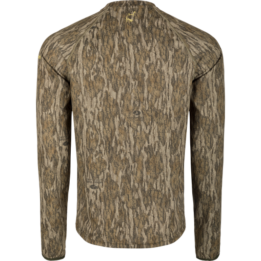 Early Bird Long Sleeve Performance Crew with Insect Repellent, featuring a tree pattern, ergonomic thumbholes, and breathable fabric for outdoor activities.