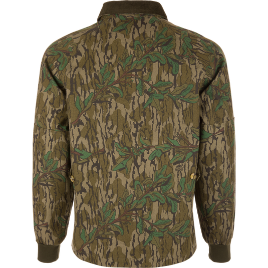 Throwback 80 Field Shirt Jacket with a camouflage pattern, showing triple-needle stitching, antique brass riveted pockets, and reinforced forearms for durability.