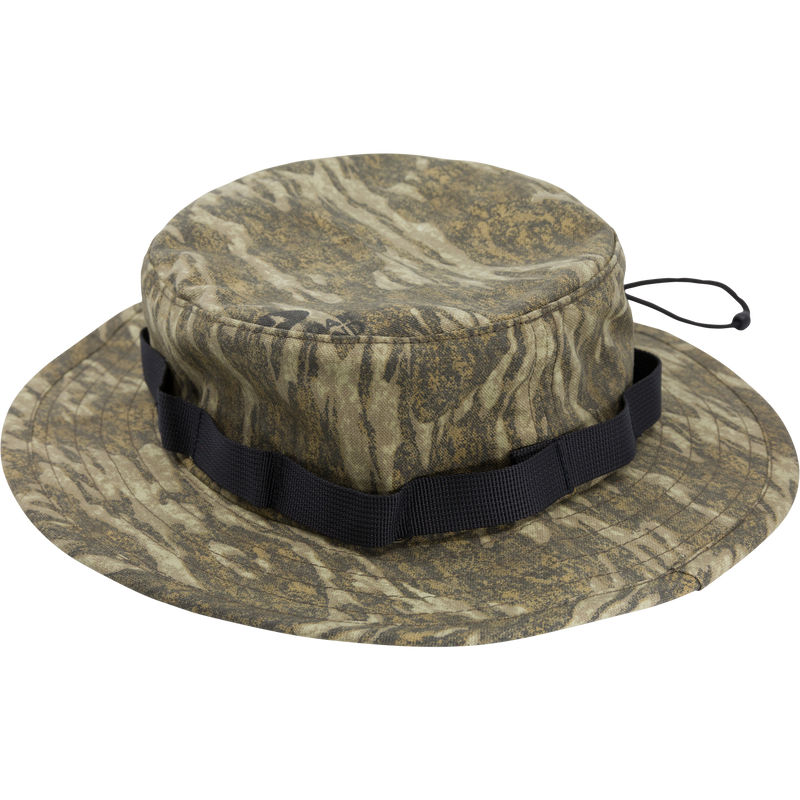 DUK Boonie Hat with black band, 100% cotton, features full brim, adjustable drawstring. Ideal for outdoor activities, providing comfort and sun protection.