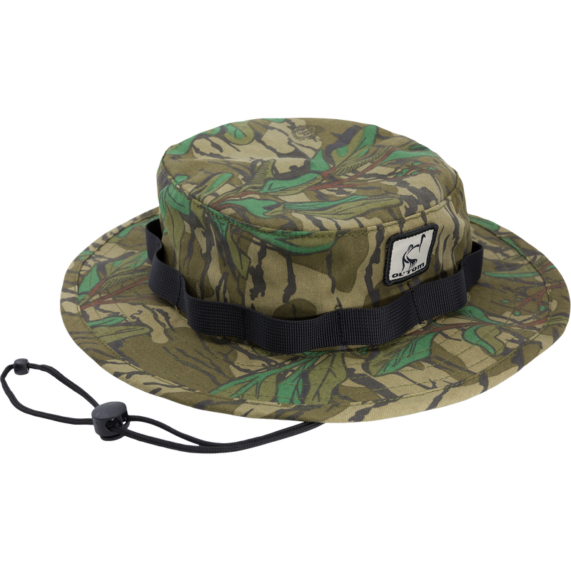 DUK Boonie Hat with camouflage design, adjustable drawstring, and full brim, crafted from durable cotton for outdoor activities.