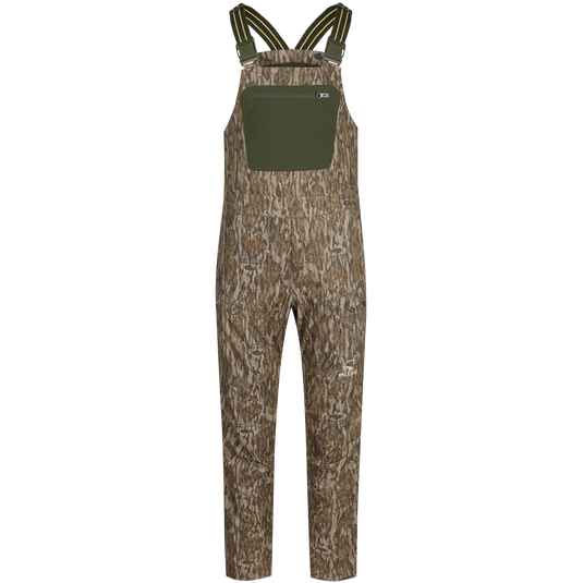 Turkey Bib with Spider Web Technology featuring camouflage design, comfort waistband, stretch waist pockets, and cargo storage for superior mobility and water resistance in hunting settings.