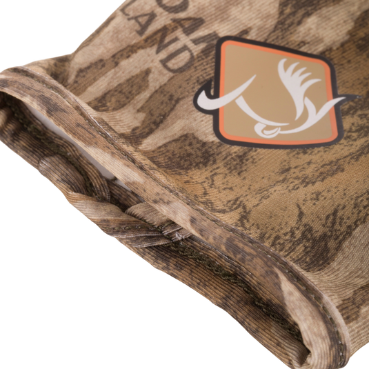 Performance Stretch-Fit Shooter Turkey Gloves showcasing close-up of the silicone grip texture on camouflage fabric, highlighting superior grip for outdoor activities.