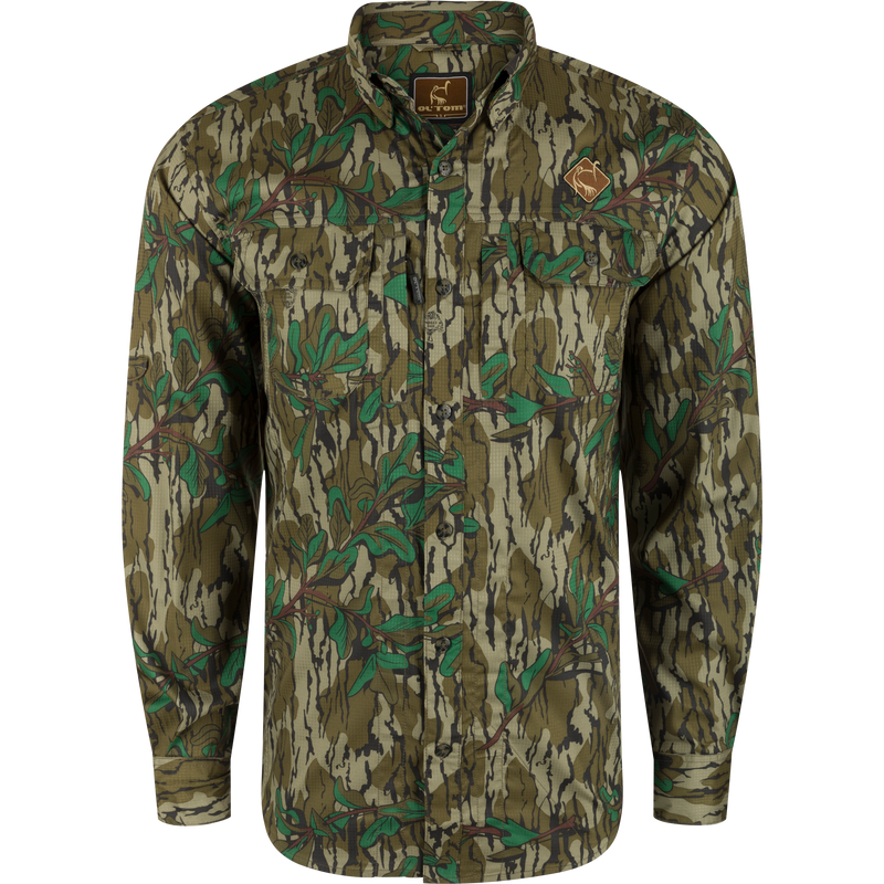 Youth Wingshooter Trey Long Sleeve Shirt featuring a camouflage pattern, logo, hidden button-down collar, vented back, and dual chest pockets, designed for performance and versatility.