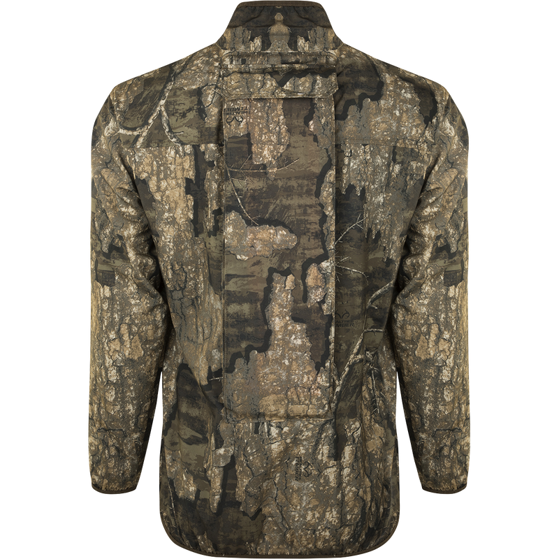 A close-up of the Tech 1/4 Zip with Spine Pad, a camouflage jacket with various chest pockets and a removable spine pad for comfort.