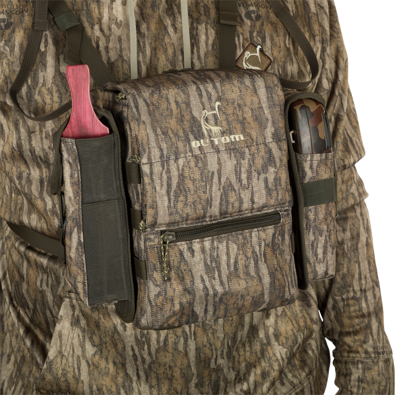 Run-N-Gun Turkey Chest Pack with camouflage design, featuring multiple compartments, detachable bino harness, and accessories, perfect for hunting trips.