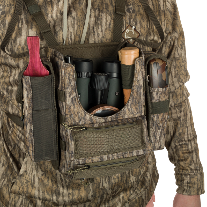 Run-N-Gun Turkey Chest Pack with integrated bino harness, multiple pockets, and a stowable rain fly, ideal for hunting adventures.