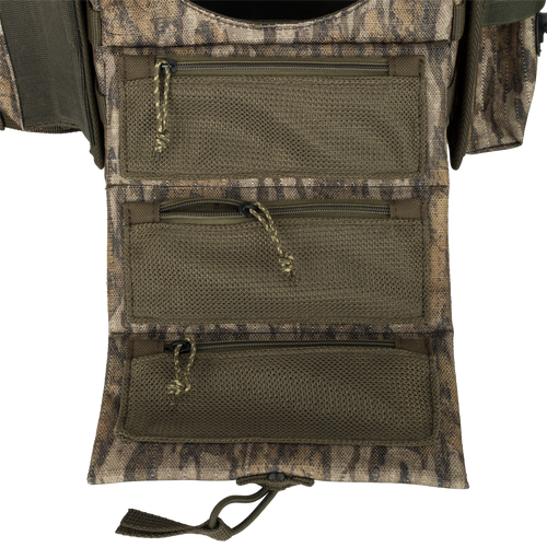 Run-N-Gun Turkey Chest Pack with multiple zippered pockets, detachable bino harness, and stowable rain fly, designed for lightweight hunting trips and gear organization.