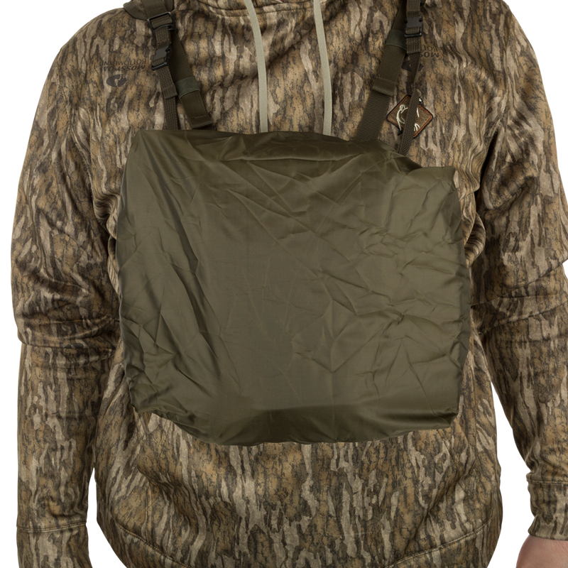 Run-N-Gun Turkey Chest Pack displayed on a person, showcasing its rain cover.